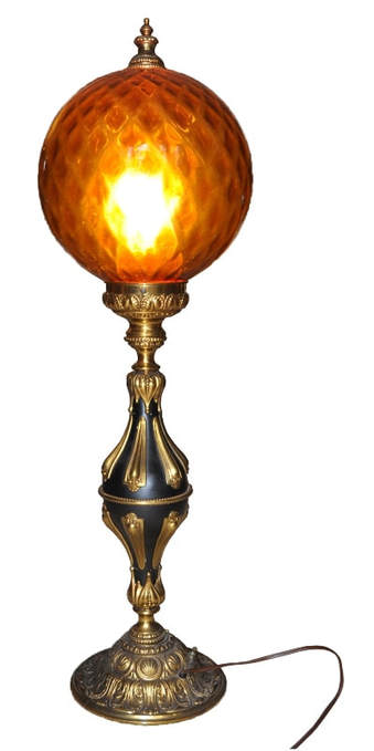 Ornate parlor style table lamp with huge amber glass globe